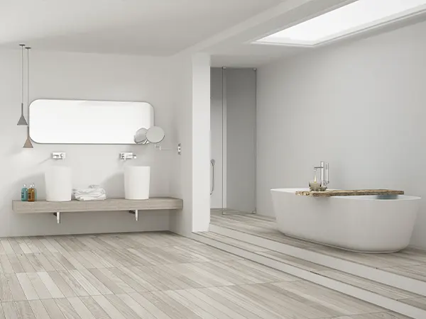 A white bathroom with luxury vinyl tile