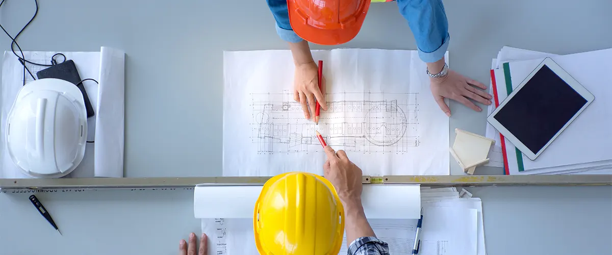 Inspectors checking the building permits for a bathroom renovation