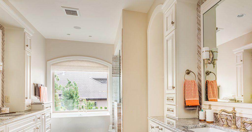 wide bathroom with white tile