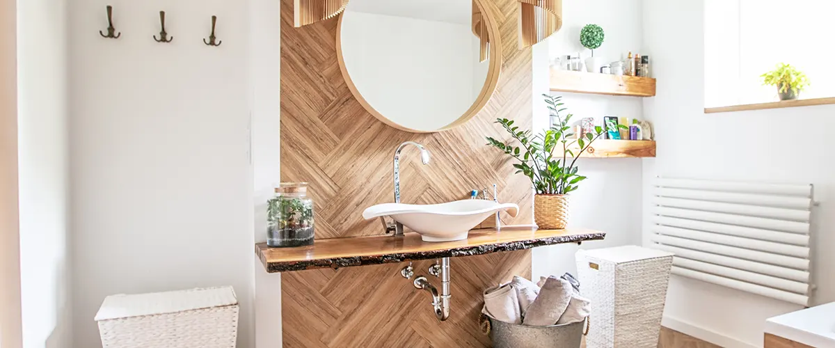 wooden like backsplash and round mirror