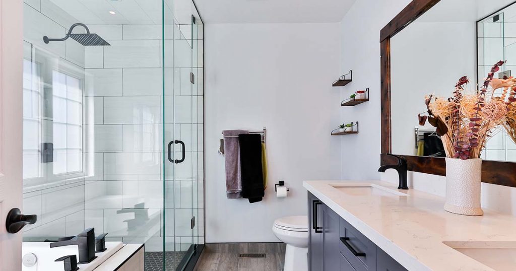 modern bathroom with dark cabinets