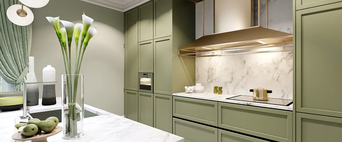 sage green cabinets and golden features