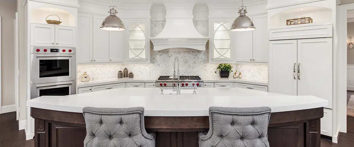 A white kitchen with wood