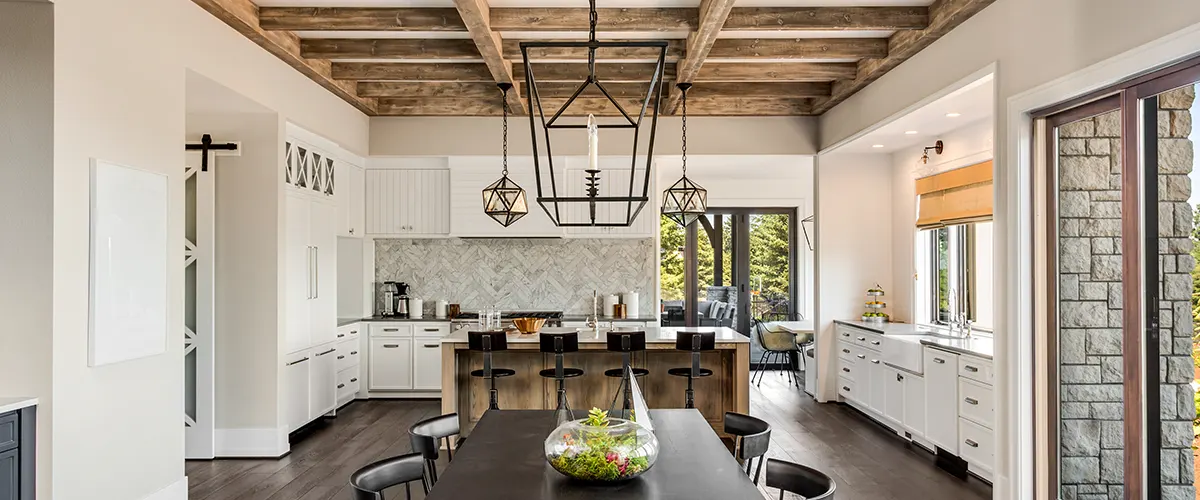 A cool kitchen with visible wooden frames on the ceiling