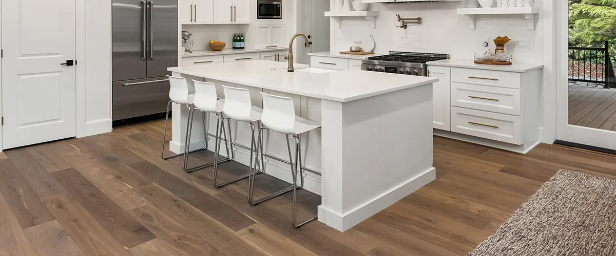 Lvt Flooring And White Cabinets.webp