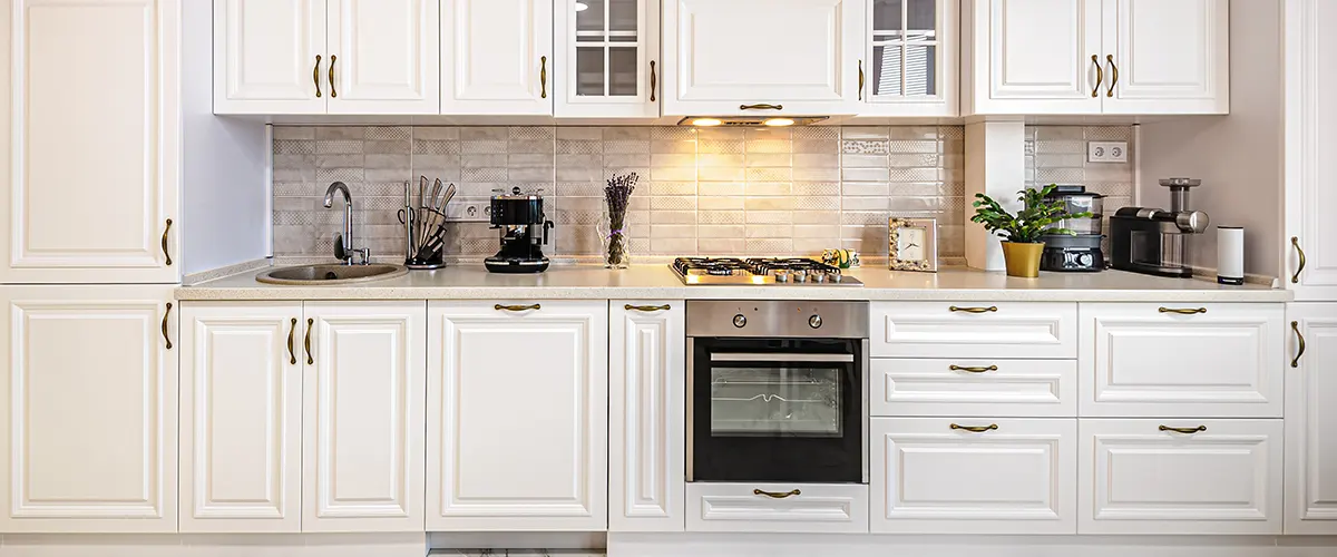 White simple kitchen cabinets in a renovated kitchen in Missisauga