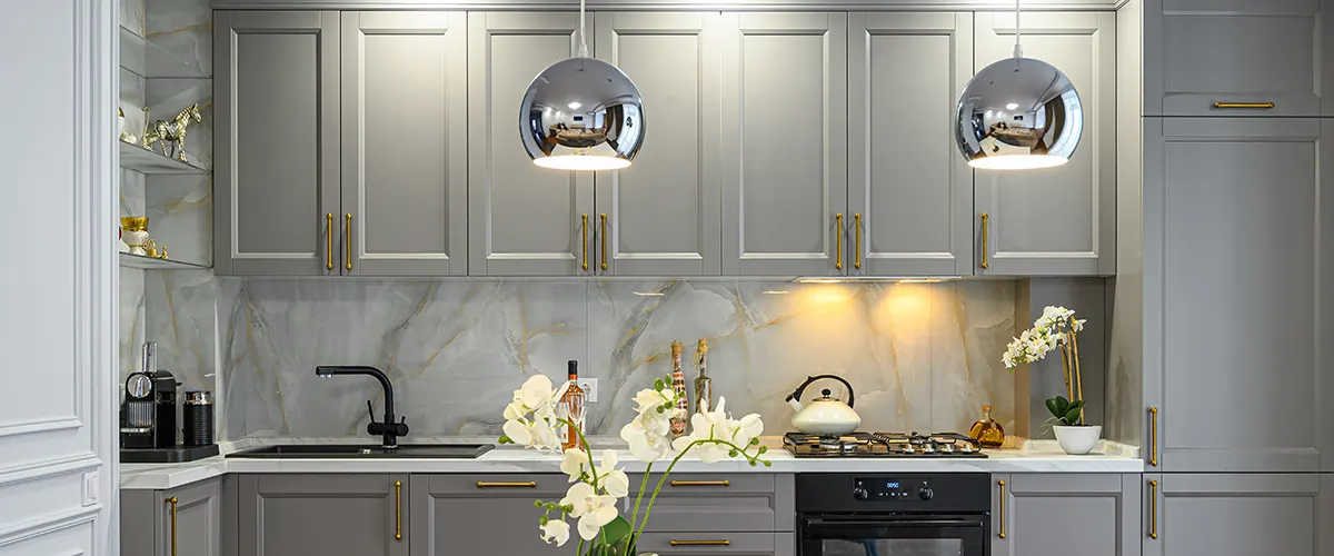 Large counter space in a kitchen with gray cabinets