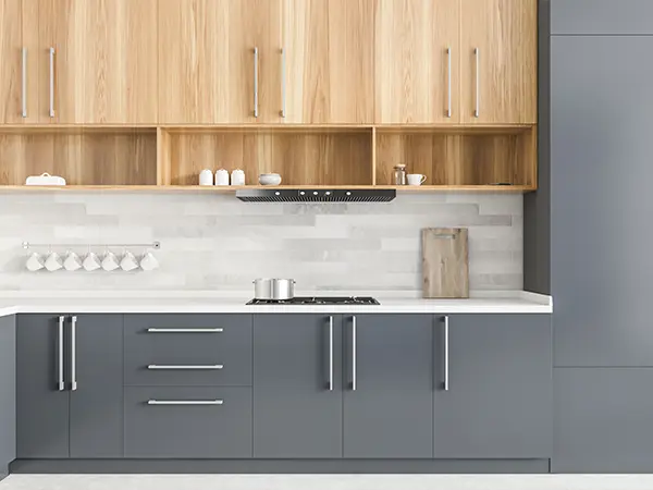 Modern gray base cabinets and wooden upper cabinets