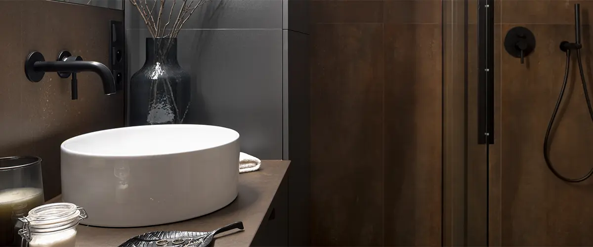 Eclectic style with vessel sink and dark shower
