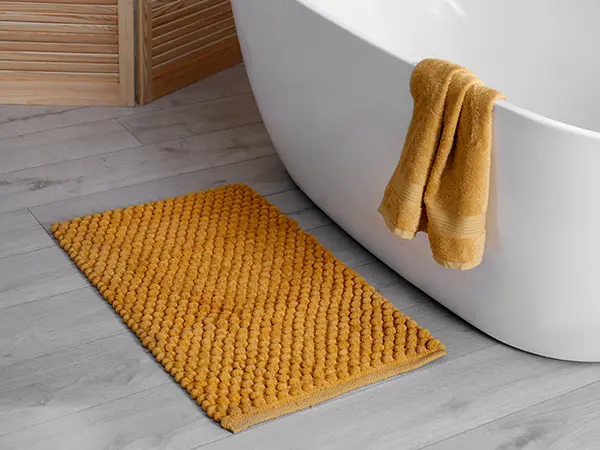 LVP flooring with orange mat